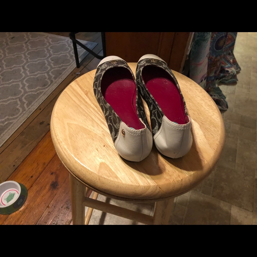 Coach flats.